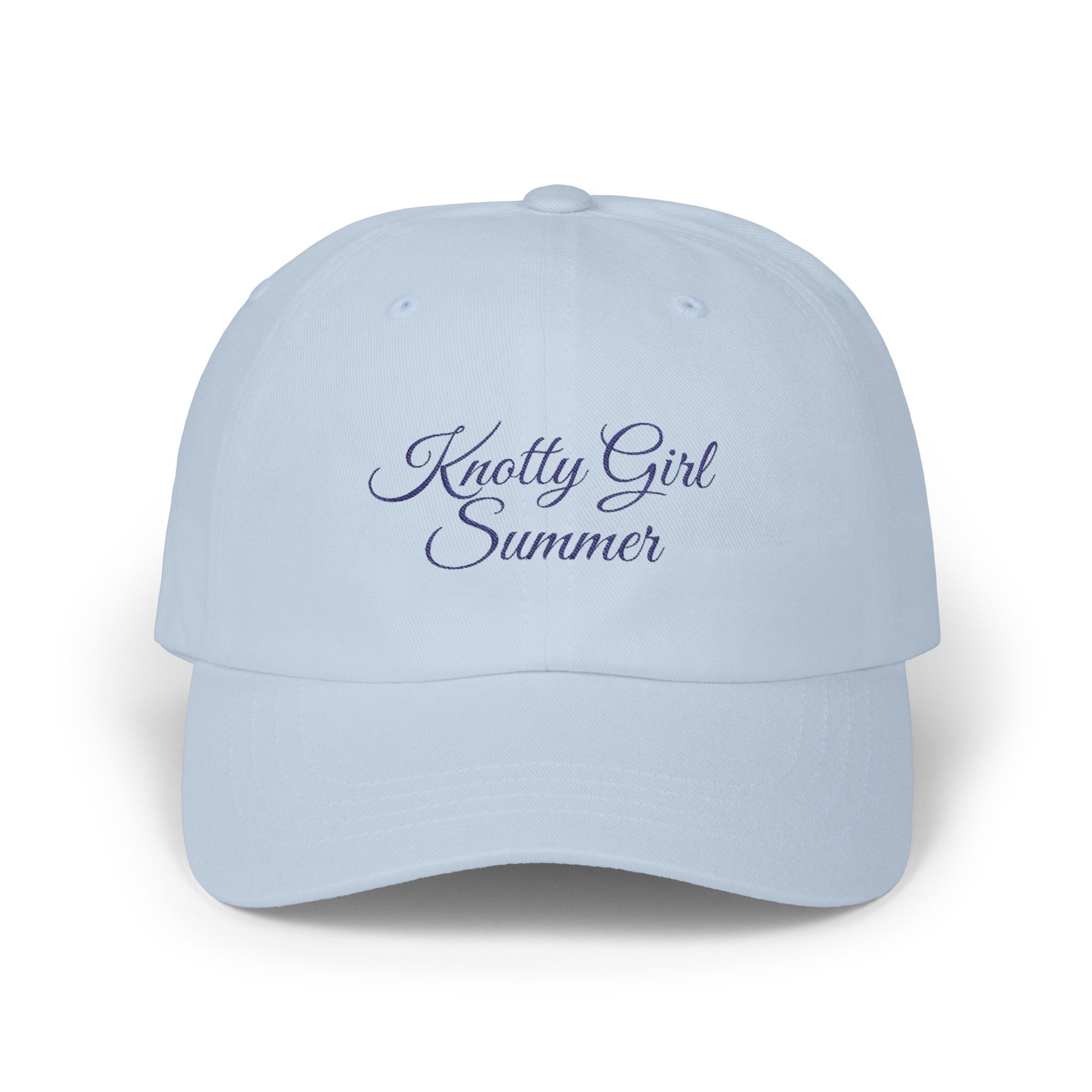 Embroidered Knotty Girl Summer hat with navy lettering.
